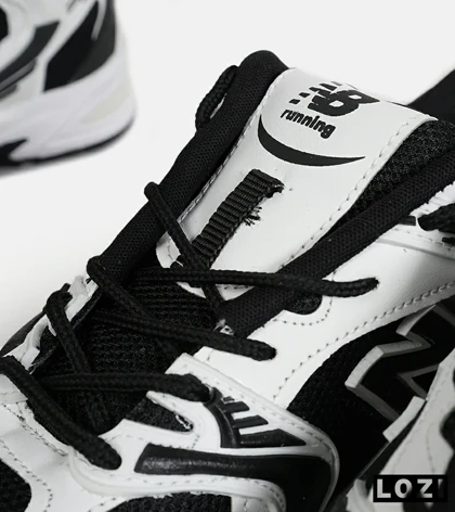 کفش کتانی مردانه و زنانه سفید مشکی NEW BALANCE 530