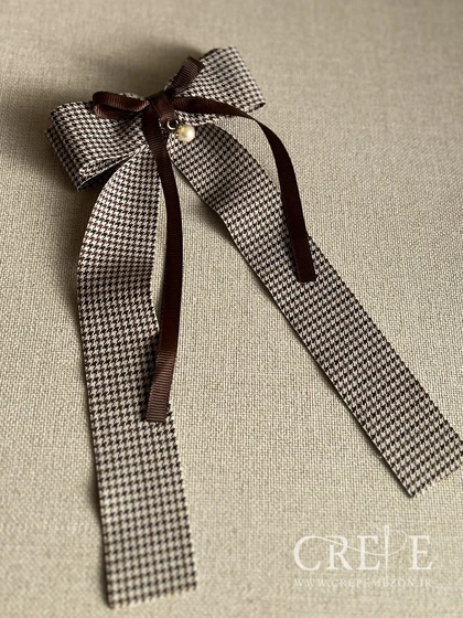 گیره پاپیون و مروارید دنباله دار