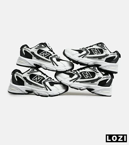 کفش کتانی مردانه و زنانه سفید مشکی NEW BALANCE 530