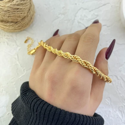 نیم‌ست زنانه مدل آئورلیا طرح طلا بافت طنابی (گردنبند، دستبند و گوشواره آویز)