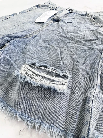 شورتک کوتاه جین پاچه ریش زاپ‌دار