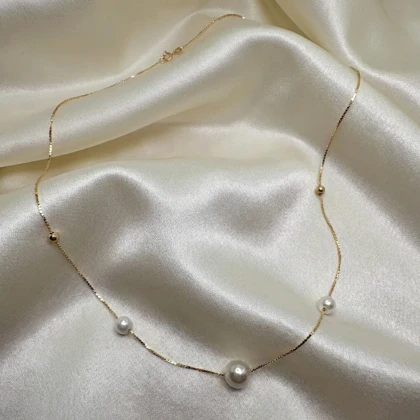 گردنبند ژوپینگ مدل "اشک فرشته" | ترکیب مروارید و گوی طلایی با درخشش ابدی