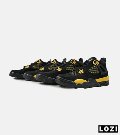 کفش کتانی ساق‌دار مردانه مشکی زرد Nike air jordan 4