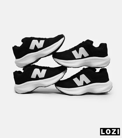 کفش کتانی مردانه مشکی سفید NEW BALANCE 547