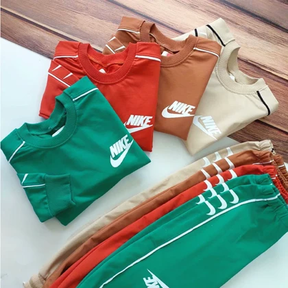 بلوز شلوار بچه گانه طرح نایک بغل خط‌دار