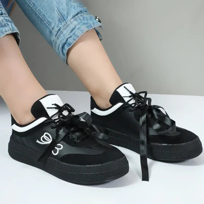 کفش کتانی زنانه رنگ مشکی مدل پاپیون کد 81740