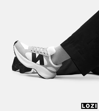 کفش کتانی مردانه سفید طوسی مشکی NEW BALANCE 547