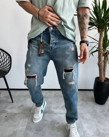 شلوار مام فیت رنگ خاص زاپ‌دار LEVIS