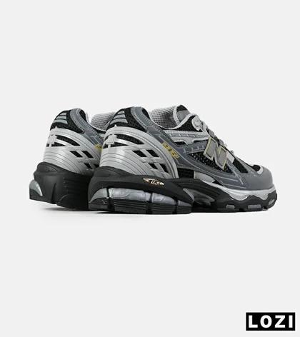 کفش کتانی بزرگ پا طوسی مشکی New Balance 1906R مدل 8307