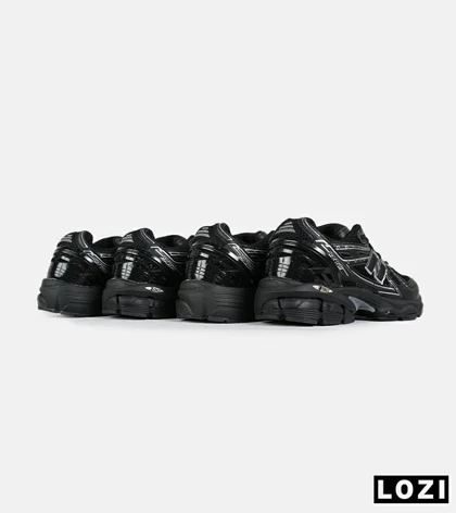 کفش کتانی بزرگ پا مشکی New Balance 1906R مدل 8304