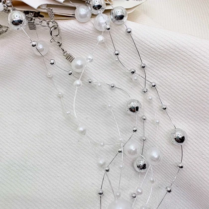 گردنبند نامرئی طرح «مروارید معلق» (Illusion Necklace) | مینیمال و اقتصادی