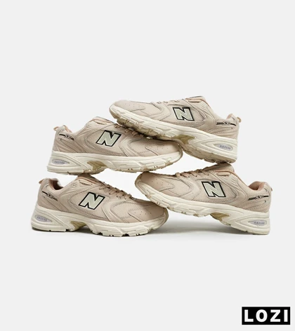 کفش کتانی مردانه و زنانه کرم NEW BALANCE 530