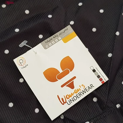 کراپ تاپ زنانه مدل پددار خال‌خالی رنگ مشکی ماییلدا کد 5301-6853