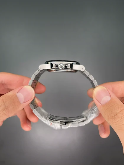 ساعت مچی پتک فیلیپ ناتیلوس زیرثانیه بند سیلور صفحه سفید Patek Philippe Nautilus