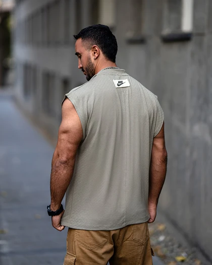 رکابی ورزشی وست NIKE نیم زیپ سبز