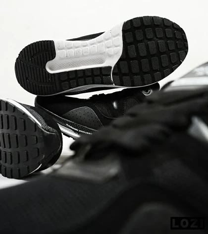 کفش کتانی طبی زنانه و مردانه مشکی سفید SKECHERS archfit v02