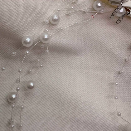 گردنبند نامرئی طرح «مروارید معلق» (Illusion Necklace) | مینیمال و اقتصادی