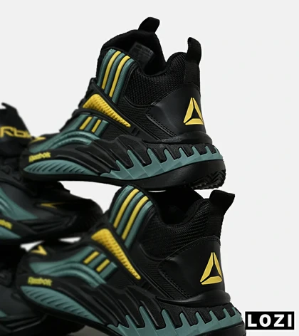 کفش کتانی ساق‌دار مشکی فیلی زرد Reebok Shaq Attaq