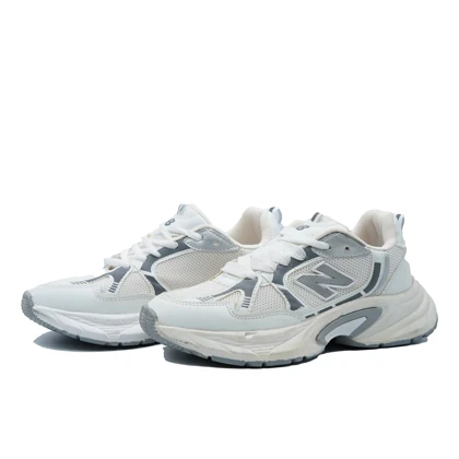 کفش کتانی زنانه نیوبالانس مدل 0679 New Balance