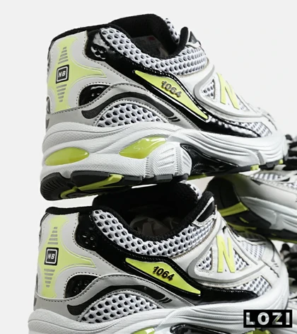 کفش کتانی مردانه و زنانه سفید مشکی لیمویی NEW BALANCE 1064 V.2 مدل 7010