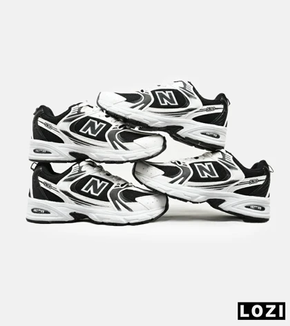 کفش کتانی مردانه و زنانه سفید مشکی NEW BALANCE 530