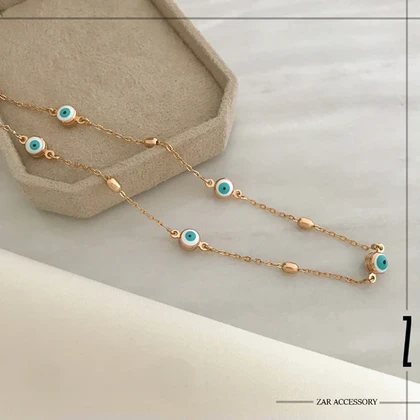 گردن‌بند چشم نظر و گوی کالباسی