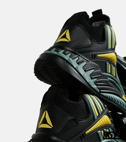 کفش کتانی ساق‌دار مشکی فیلی زرد Reebok Shaq Attaq