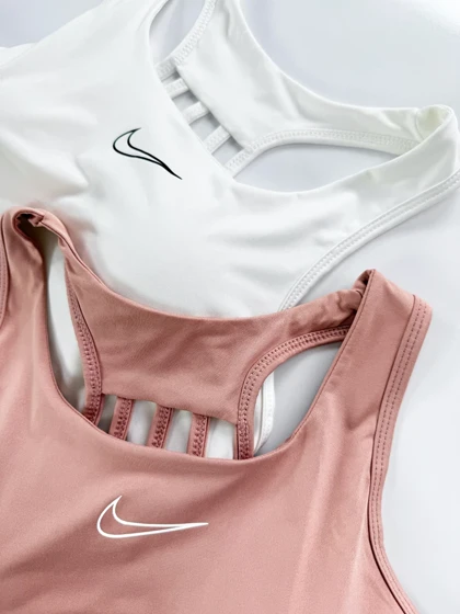 نیم‌تنه کاپ‌دار ورزشی فلامنت پشت قهرمانی بندی نایکی Nike