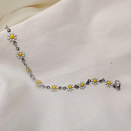 دستبند گل بابونه استیل نقره ای