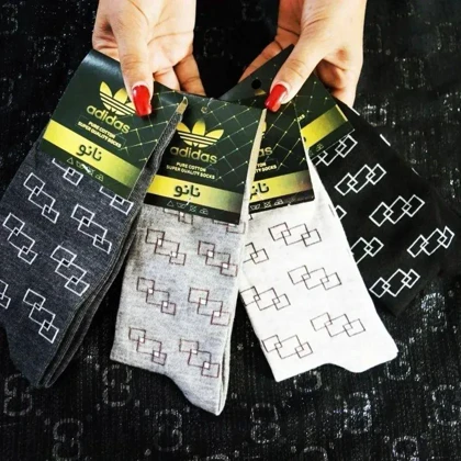 تولیدی جوراب مردانه ساق بلند پک اقتصادی 12 جفتی مناسب کارمندان بسته بندی سلفونی 12 جفتی پنجه گیری روسو تخت فری سایز 38 الی 46