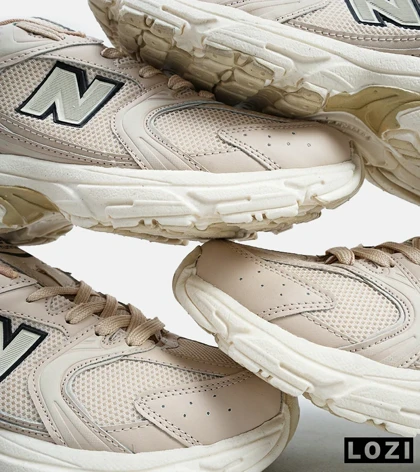 کفش کتانی مردانه و زنانه کرم NEW BALANCE 530