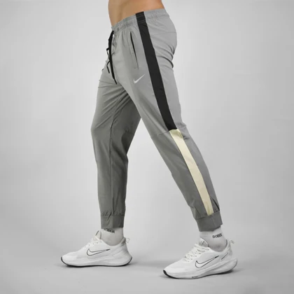 شلوار اسپرت نایک مدل DRI FIT-CK2149 طوسی روشن