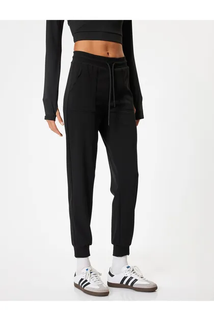 شلوار ورزشی Jogger جیب کمری توری مفصل با تناسب راحت 5WAK40042NK