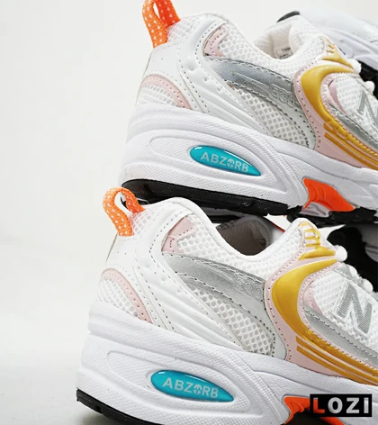 کفش کتانی زنانه صورتی زرد NEW BALANCE 530