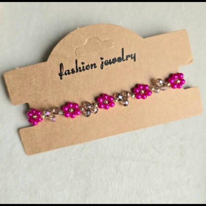 دستبند شکوفه و گل مروارید و کریستال دست ساز