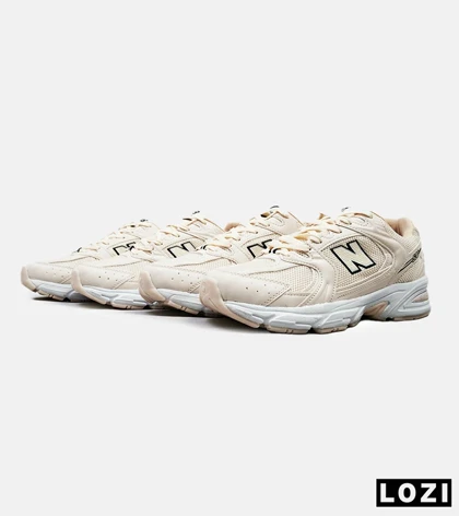 کفش کتانی مردانه و زنانه کرم NEW BALANCE 530