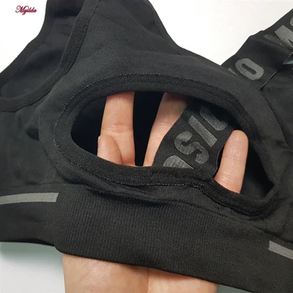 ست نیم‌تنه و شلوارک ورزشی زنانه مدل سیملس پشت چین‌دار کد 5562-2333