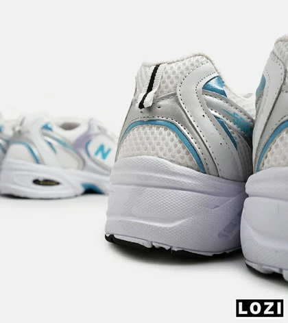 کفش کتانی مردانه و زنانه سفید آبی یاسی NEW BALANCE 530