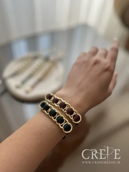 دستبند چرم طرح برند