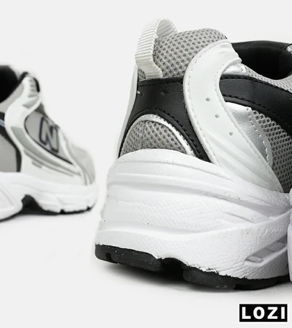 کفش کتانی مردانه و زنانه سفید طوسی مشکی NEW BALANCE 530 مدل 6642