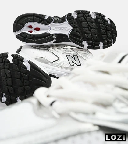 کفش کتانی بزرگپا سفید نقره ای NEW BALANCE 530