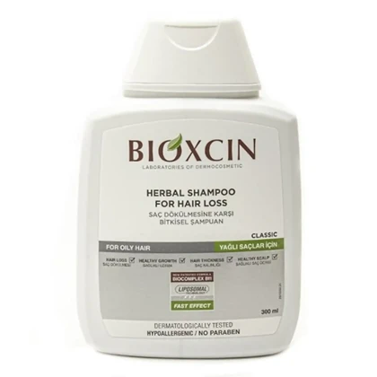 شامپو مایع تقویت‌کننده و ضد ریزش بایوکسین مناسب موهای آسیب‌دیده و در حال ریزش حجم 300 میلی‌لیتر