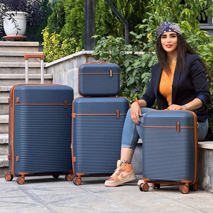 چمدان نشکن تیتان پلورا مدل TITANPLORA - TP6600SERIES Universal Travelle سری 4 عددی (کیف آرایشی هدیه)