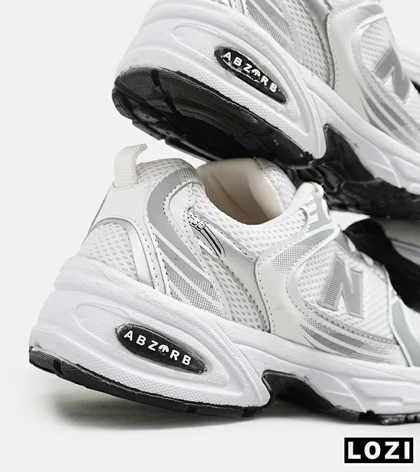 کفش کتانی مردانه و زنانه سفید طوسی نقره ای NEW BALANCE 530