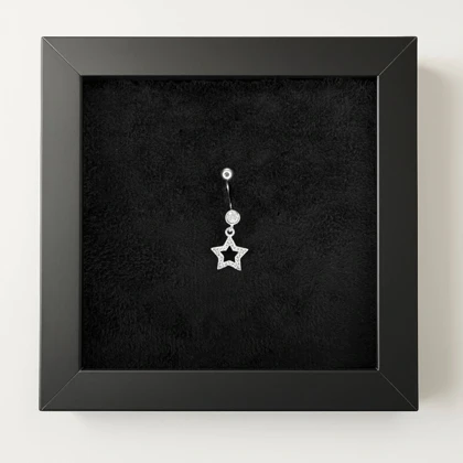 پیرسینگ نقره ناف نگین‌دار با آویز ستاره