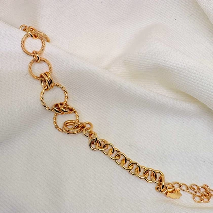 دستبند برند شین مدل «حلقه‌های درهم‌تنیده» | بافت برجسته