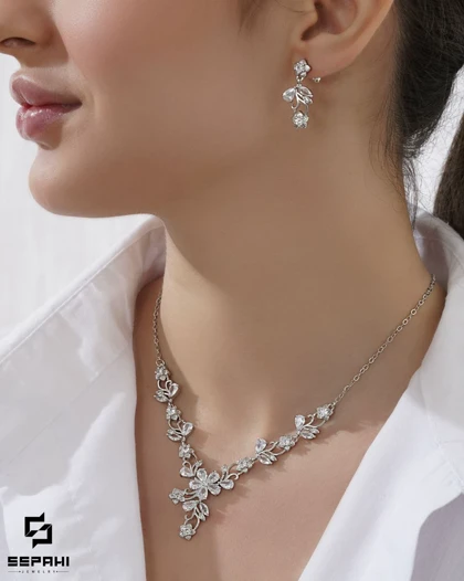 نیمست گردنبند و گوشواره جواهری