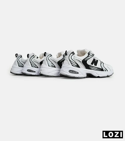 کفش کتانی مردانه و زنانه سفید طوسی مشکی NEW BALANCE 530