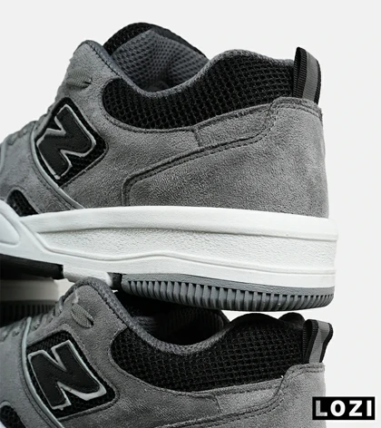 کفش کتانی مردانه و زنانه طوسی مشکی NEW BALANCE 550