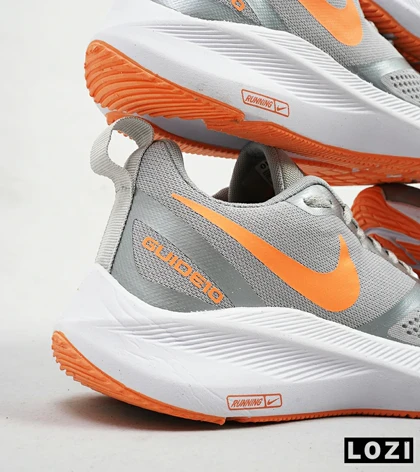 کفش کتانی مردانه طوسی نارنجی Nike guide 10
